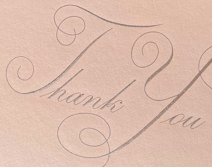 Detail of hand engraved “Thank You”